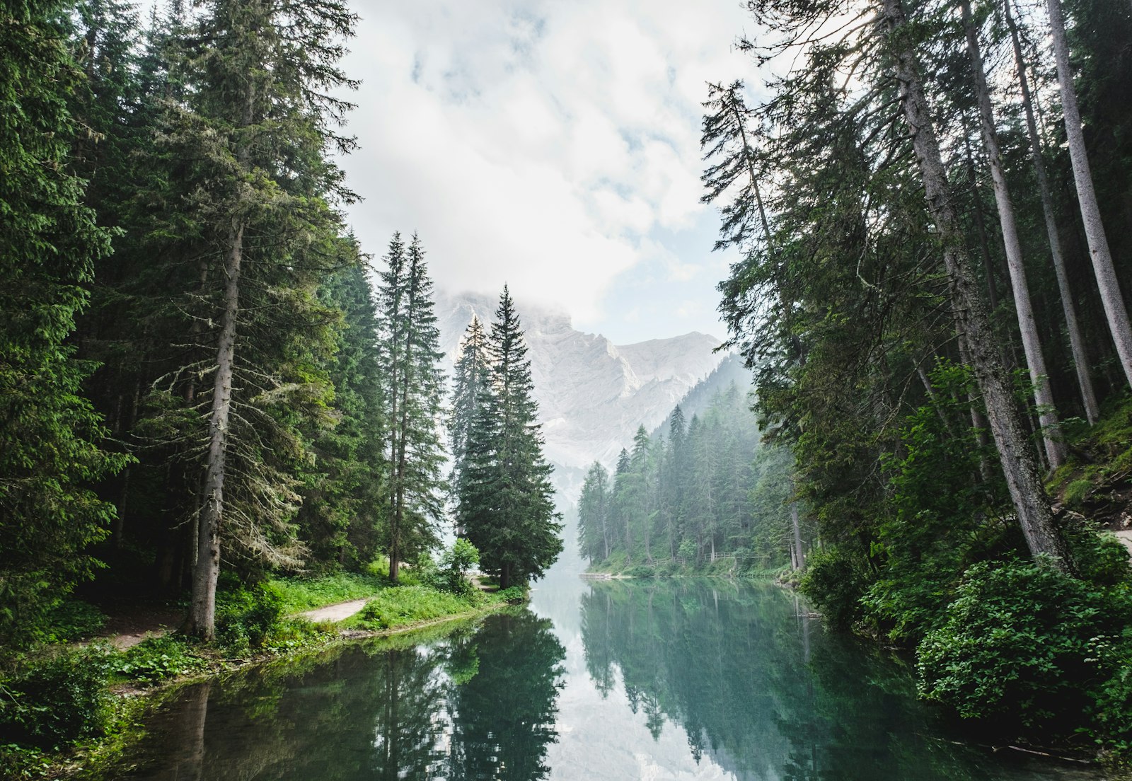 Gravel lane standing in for a hunter-width trail — Unsplash